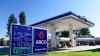 Gas dips below $4 a gallon for the first time this travel season as summer road trips begin