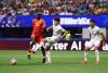 DR Congo rallies past Uzbekistan 3-1 to reach World Cup knockout stage.