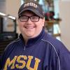 Belgrade native garners awards for community service and saving a student organization