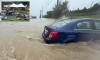 Massive floods leave four dead in Kentucky - as meteorologists warn MORE rain is on the way