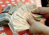 Bolivia abandons dollar peg to restore stability