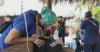 Medical workers provide emergency care at temporary medical station for quake victims in Venezuela