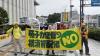 Monthly anti-war protest held outside U.S. Naval Base despite heavy rain