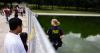 Tourists ordered to stop loitering at tourist attraction Reflecting Pool as National Guards lurk
