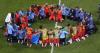 One Extraordinary Photo: Congo players and staff gather in prayer after a win