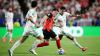 Six-goal thriller ends in joy for Algeria and Austria, tears for Iran