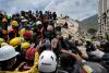 Venezuela toll rises, rescue continues