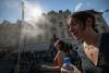 Europe's deadly heatwave scorches eastern flank, inches towards Ukraine