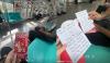 Random uncle strikes again: Man distributes uplifting messages to Singaporeans on the MRT