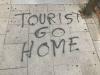 “TURISTA VE A CASA / TOURIST GO HOME”