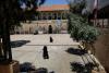 Hundreds of thousands of Lebanese head home as fighting eases, many still stranded