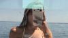 England Wag puts on busty display on holiday in two-piece after her partner missed out on World Cup spot