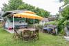 Local Beacon Couple Create Community Through Cookouts in Their Two-Bedroom Home