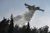 Two dead as wildfires gut house in northern Greece as village evacuated