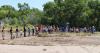 A group gathers in a dry river bed to highlight the water crisis in New Mexico
