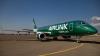 Airlink unveils its rugby-supporting green machine E190 airliner