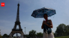 Degrees of denial: Paris blames US for climate change in heated exchange
