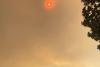 Utah sky watcher films wildfire smoke and ash falling in 'very unsettling' scene