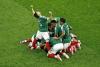 Mexico delight home fans to reach last 16 with win over Ecuador