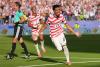 World Cup: U.S. survives red card, tops Bosnia-Herzegovina to reach Round of 16