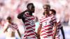 10-Men USA stun Bosnia to book last-16 slot