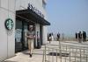 Coffee with a view: tourists flock to Starbucks overlooking North Korea