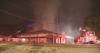 Busy Cobb County road shut down after large business fire