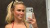 Ex-WWE star CJ Perry bursts out of patriotic tiny bikini as fans say ‘trying to break the internet?’