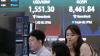 Asian stocks slide on chip sell-off as markets await US jobs data