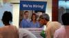 Hiring cools, wages trail inflation in mixed June jobs report