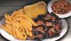 Woody’s Bar-B-Q Operator Declares Bankruptcy for Second Time