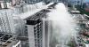 Rain falling from buildings to help combat rising heat in China is turning heads online (video)