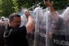 Albanian police use tear gas and pepper spray as Tirana protest turns violent