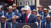 Donald Trump awkwardly jokes about military awards 'threesome' with sons in North Dakota speech