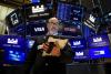 Nasdaq ends lower with tech; investors assess softer jobs data