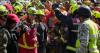 Venezuela’s interim leader angrily defends quake response as security guard is rescued after 8 days