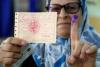 Algerians vote for new parliament, turnout projects record low