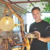 Aigai guard transforms discarded wood into art