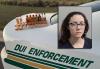 Florida Woman Arrested with Open Whiskey Bottles after Golf Course Crash