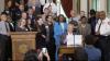 Stein signs police retention, child protection bills into law