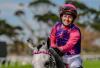 French jockey Mickaëlle Michel prepares for a historic ride at the Hollywoodbets Durban July