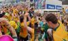Socceroos fans go WILD ahead of tie with Egypt as they do shoey with Aussie music star and party in supermarket
