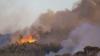 Massive wildfire engulfs Spanish holiday hotspot forcing hundreds to evacuate as 9 people were left injured in Portugal