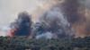 Wildfires rage in Spain and Portugal, as France heatwave deaths rise