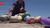 Why dozens of mystery piggy banks suddenly appeared on Texas shoreline: How much cash did they contain?