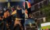 Egyptian fans bring chaos to London as they battle with police and climb on double decker bus to celebrate team's World Cup win