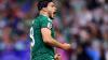 What does Mexico striker Raúl Jiménez wear on his head during the World Cup?