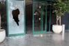 Door to Channel 12 news offices smashed by masked assailant in Tel Aviv