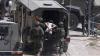 Occupation Forces Launch Sweeping Raids Across West Bank Cities and Towns