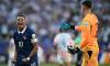 Bitter Paraguay goalkeeper Orlando Gill launches X-rated attack on Kylian Mbappe and accuses the France star of IGNORING his handshake after fiery last-16 clash